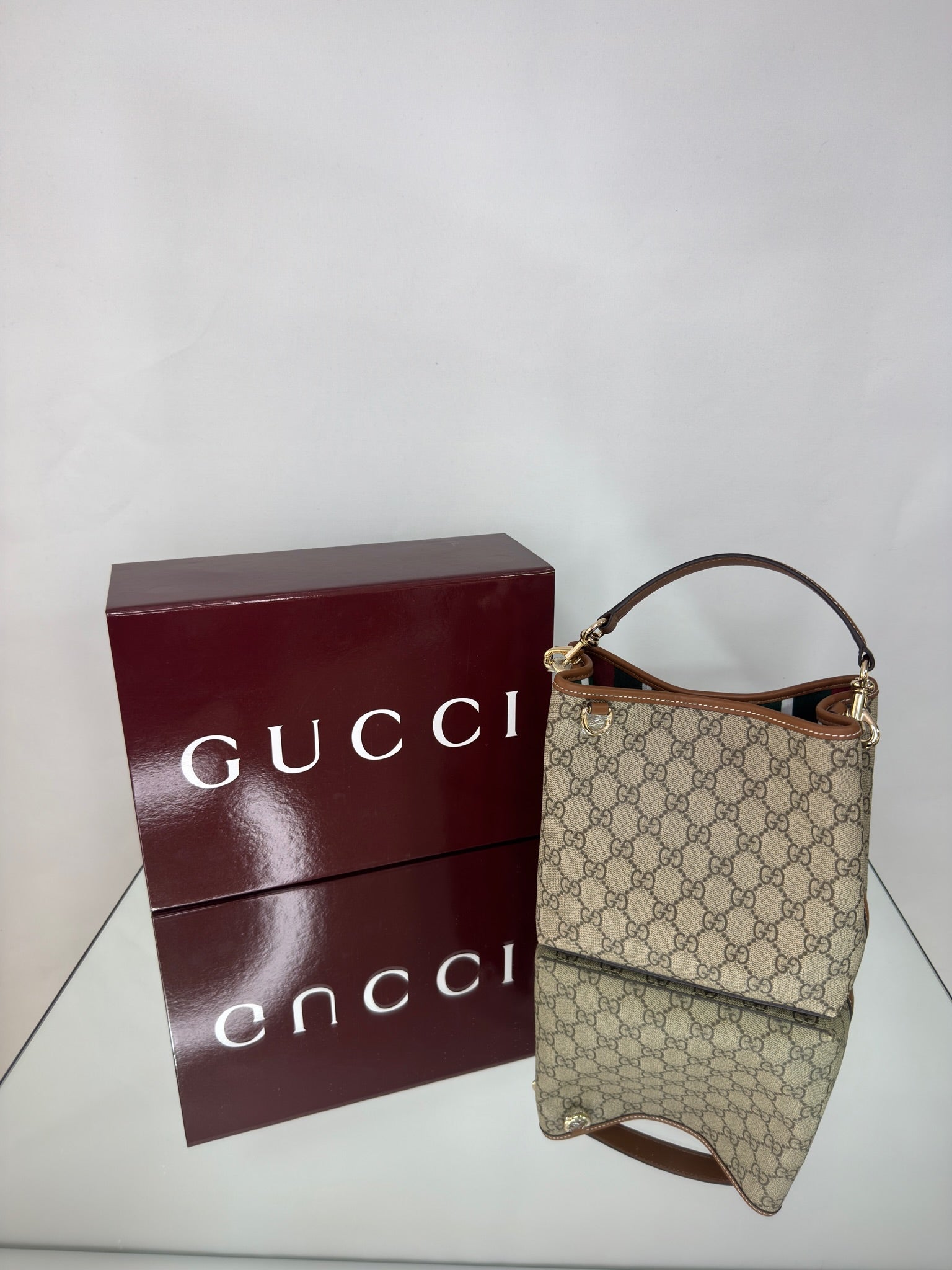Gucci GG Emblem Mini Bucket Bag