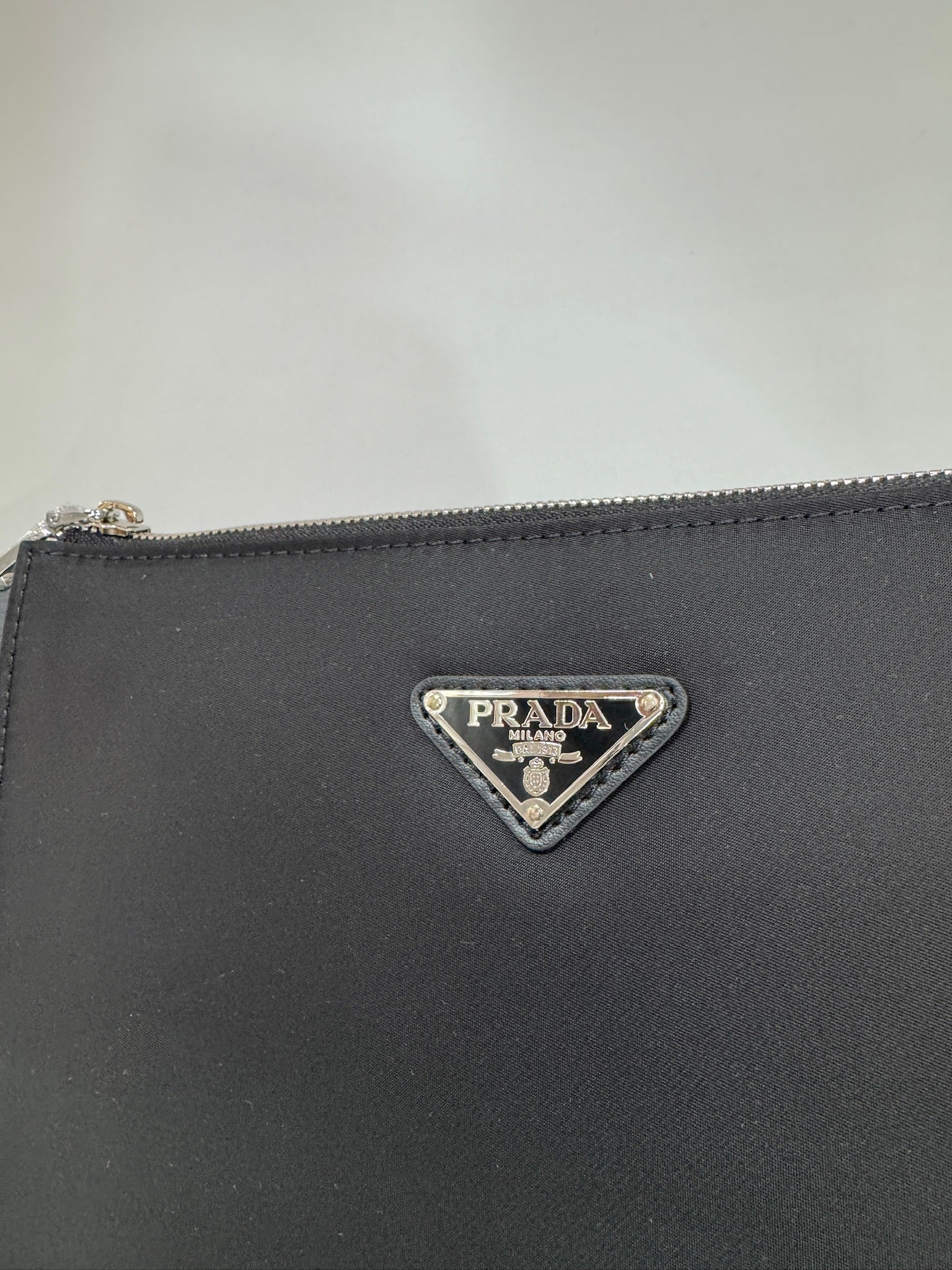 Prada Logo Plaque Clutch Bag