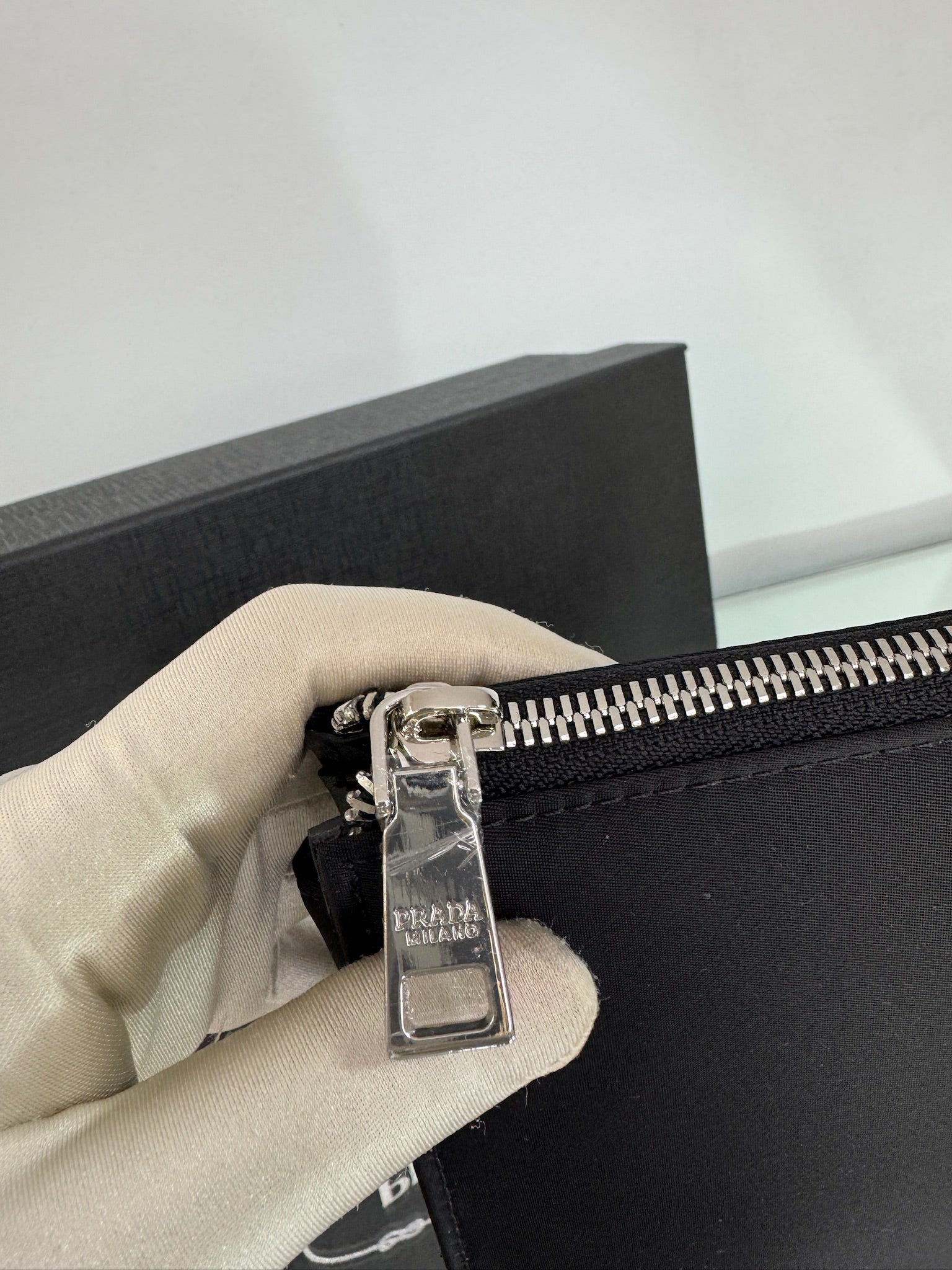 Prada Logo Plaque Clutch Bag