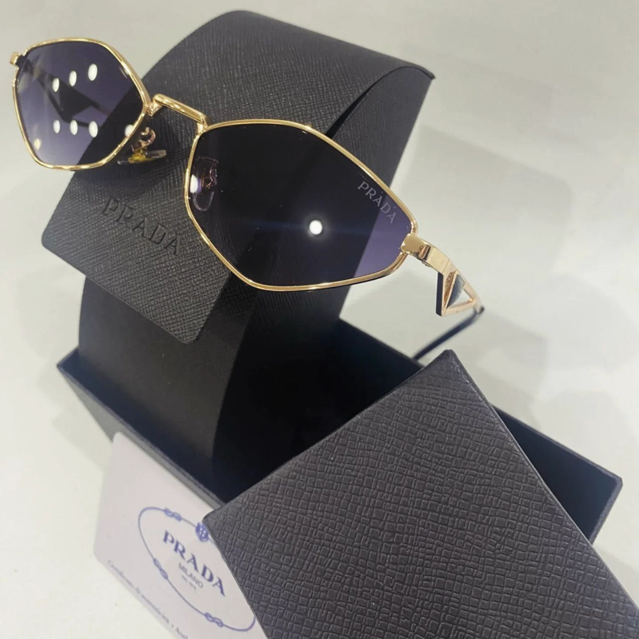 PRADA GOLD SUNGLASSES