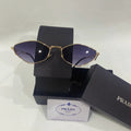 PRADA GOLD SUNGLASSES