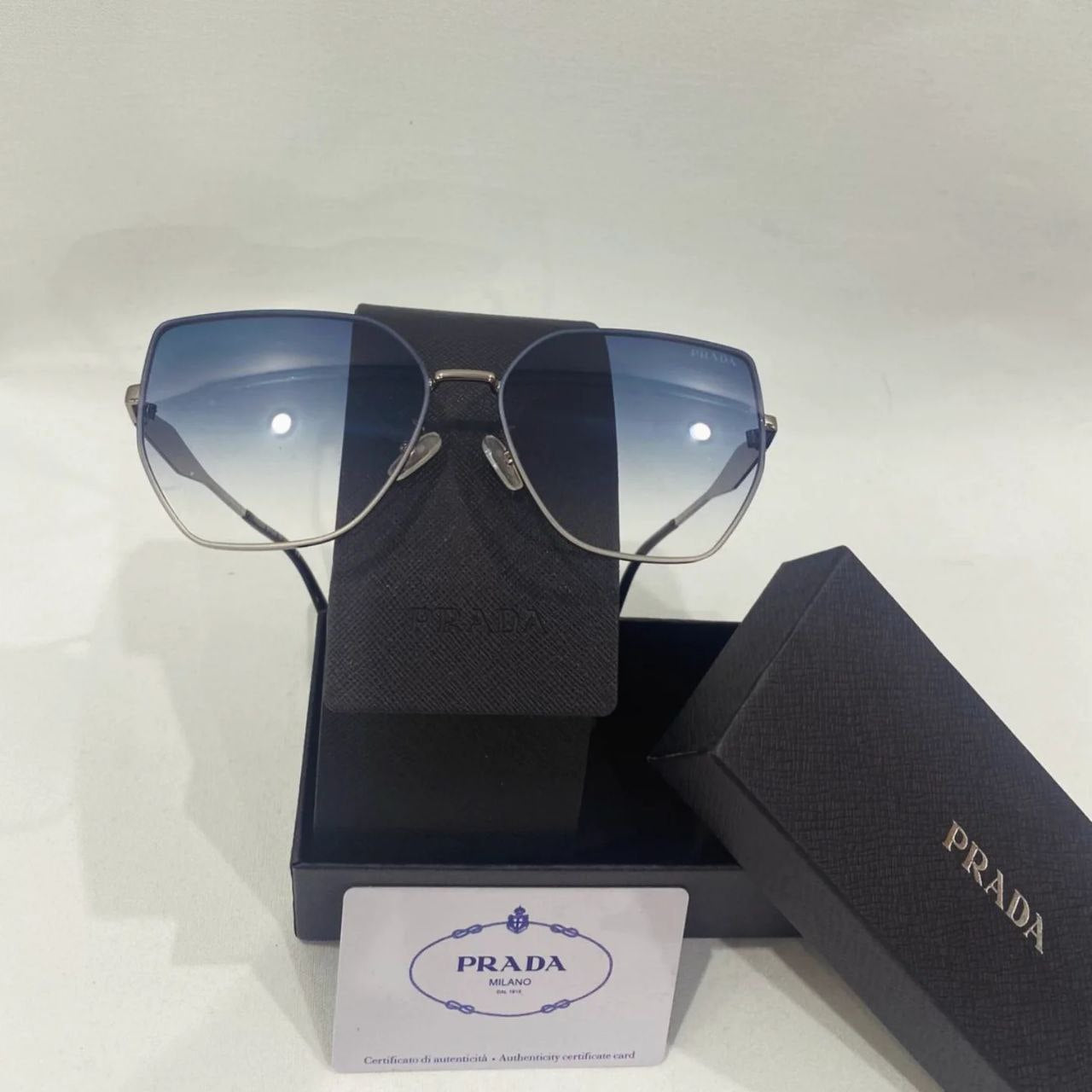 PRADA SUNGLASSES