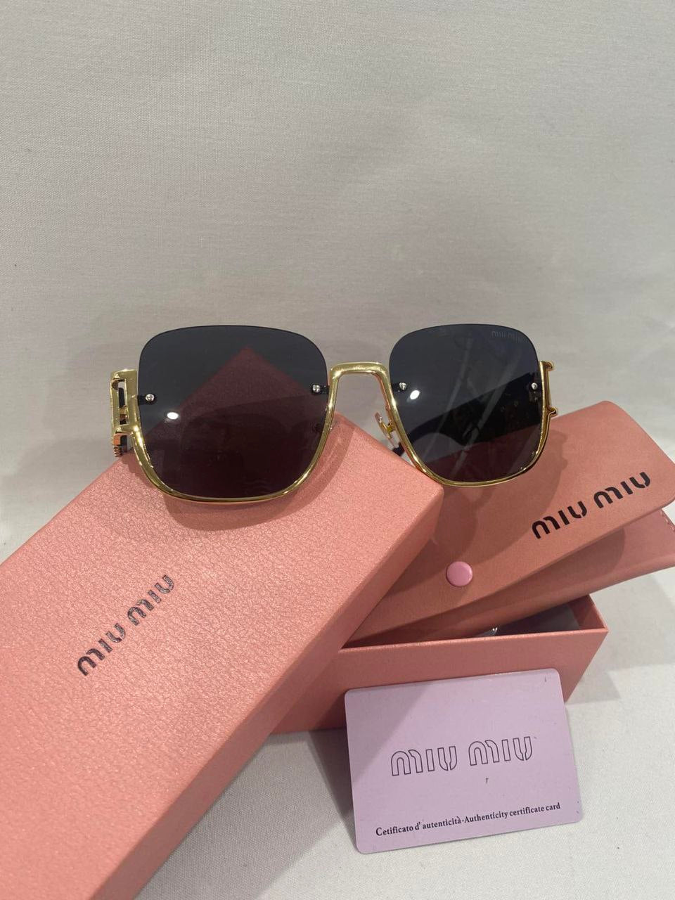 MIU MIU SUNGLASSES