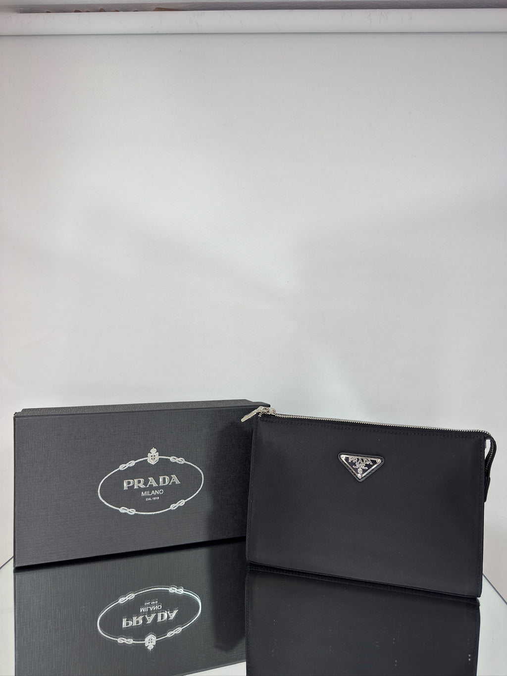 Prada Logo Plaque Clutch Bag