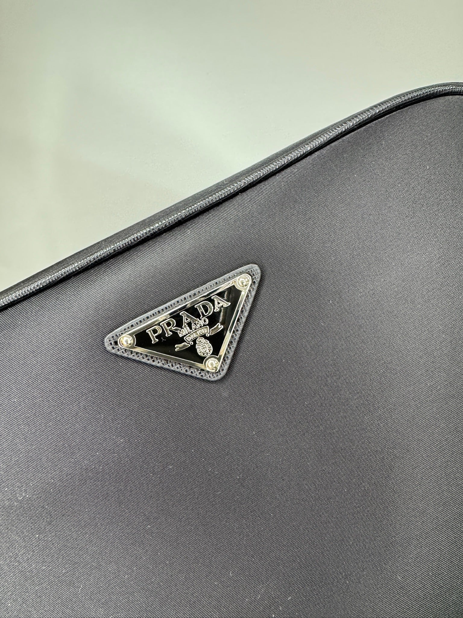 Prada Re-Nylon Saffiano Leather Clutch Bag